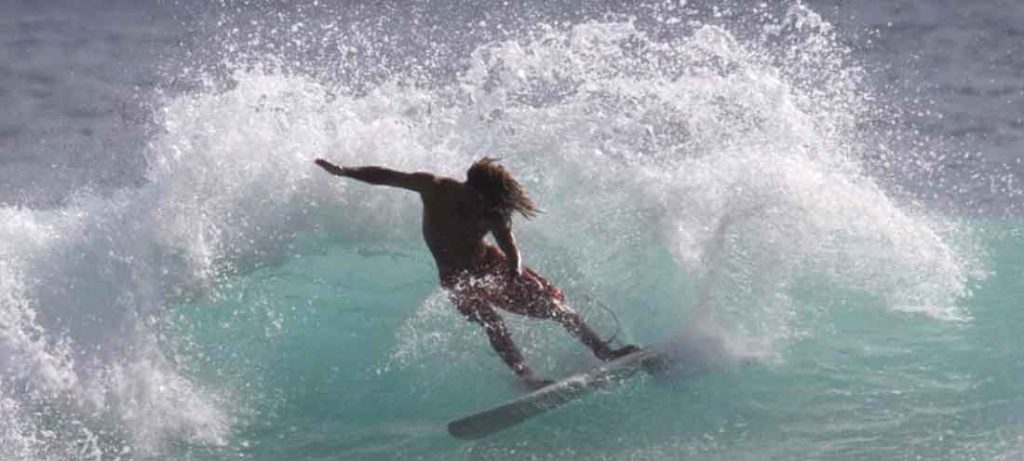 Sean Anderson surfing Publics surf on Oahu Hawai’i .